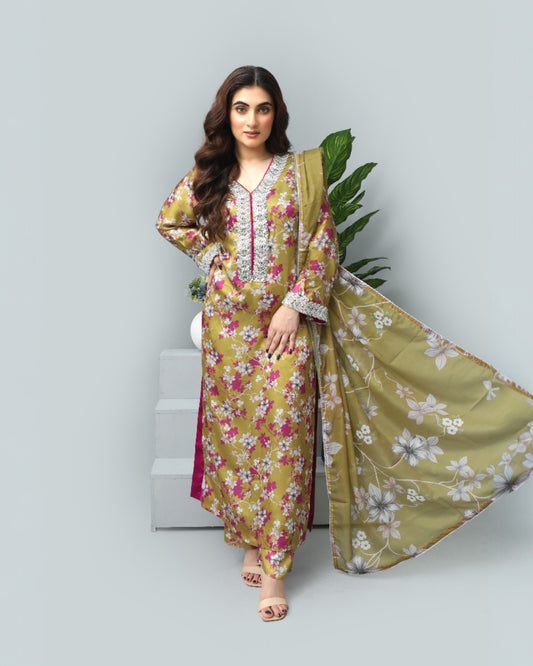 Woman wearing a floral dress with a green plant in the background