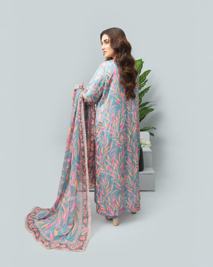 Woman wearing a floral dress with a light gray background